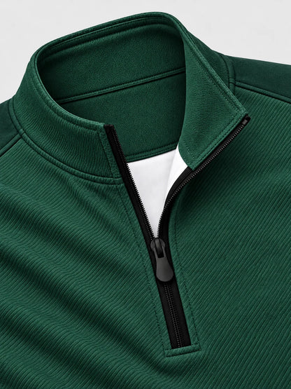 Golf-Pullover aus Funktionsmaterial in Waldgrün mit diagonaler Rippstruktur und Viertelreißverschluss