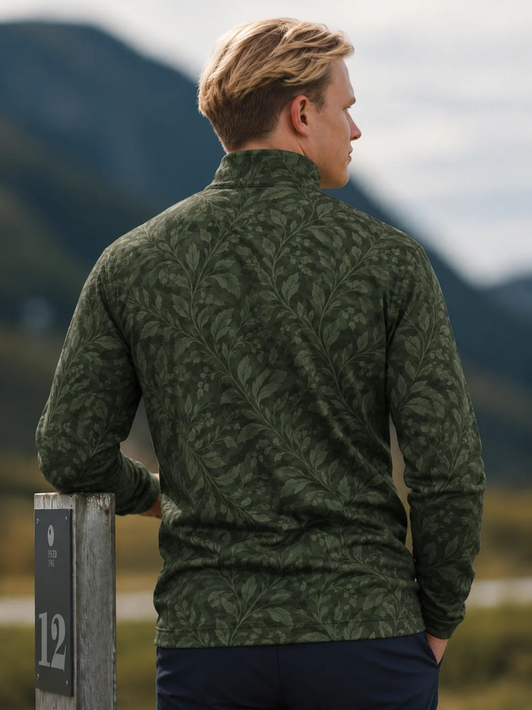 Golfpullover mit botanischem Muster in Dunkelwaldgrün, Funktionsmaterial und Viertelreißverschluss