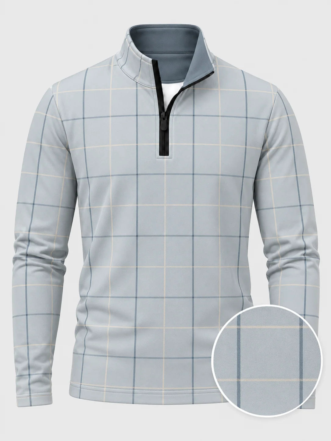 Golfpullover in Puderblau mit Fensterkaromuster und Viertelreißverschluss